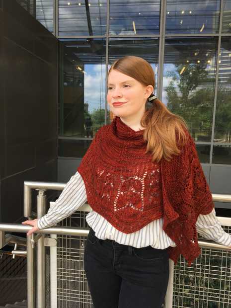 dark red Feuille-morte shawl wrapped around model's shoulders to illustrate styling