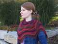 closer view of Rosita shawlette wrapped around shoulders to detail the twisted stitch texture